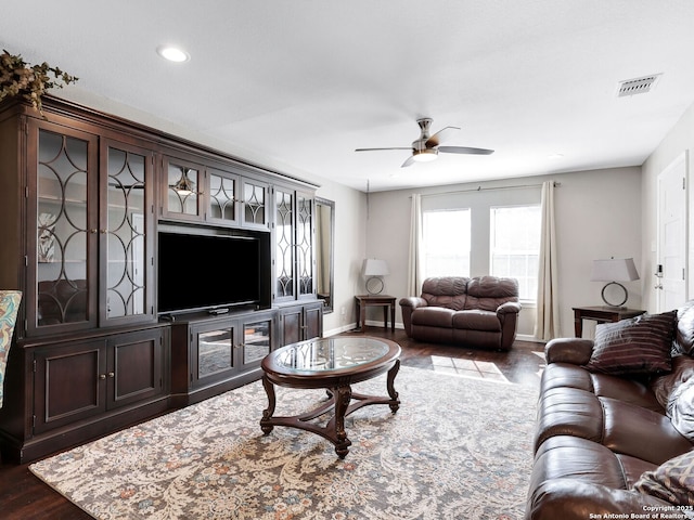 living area with visible vents, baseboards, dark wood-style floors, ceiling fan, and recessed lighting