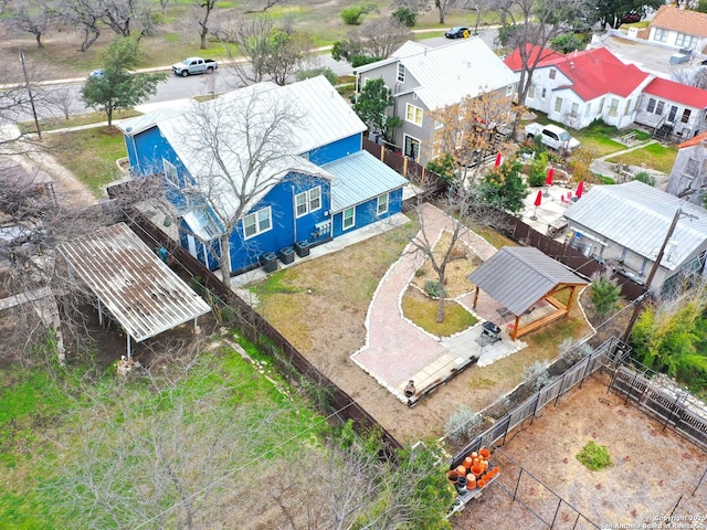 birds eye view of property with a residential view