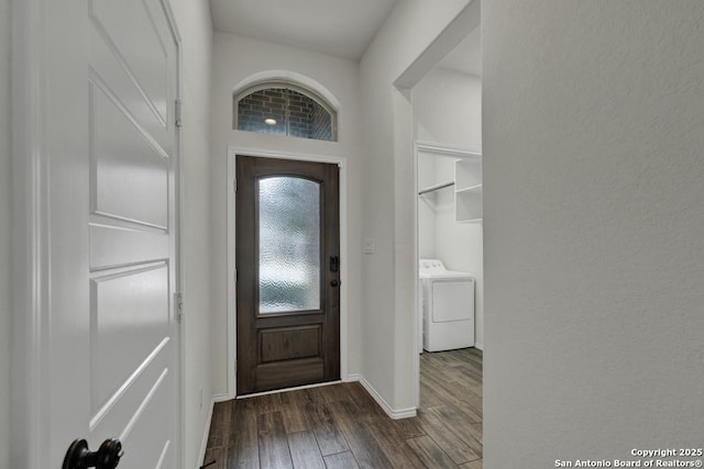 entryway featuring washer / clothes dryer and dark wood-type flooring