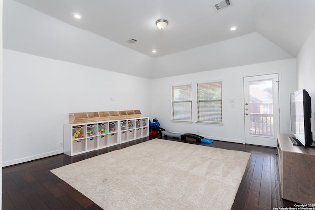 game room with lofted ceiling and dark hardwood / wood-style floors