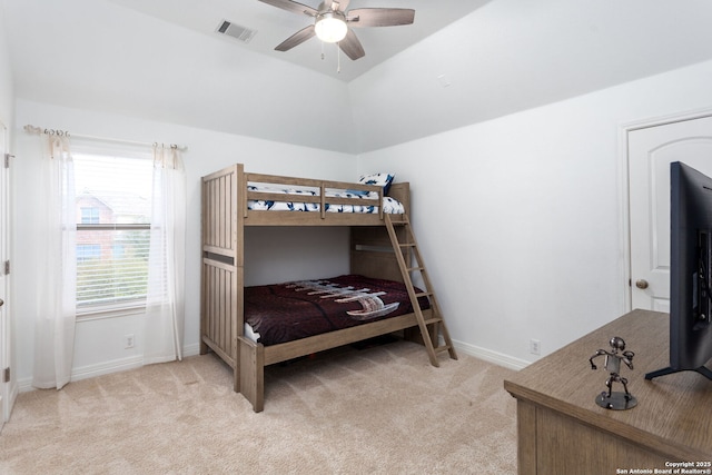 bedroom featuring ceiling fan, light colored carpet, and lofted ceiling