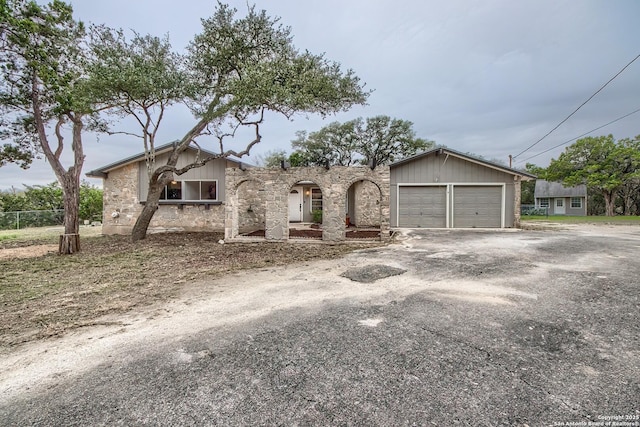 view of front of property with a garage