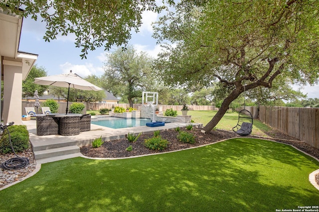 view of swimming pool with a patio area
