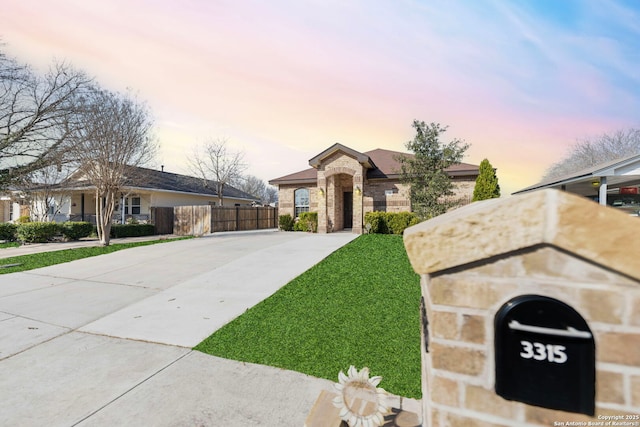 view of front of house with a lawn