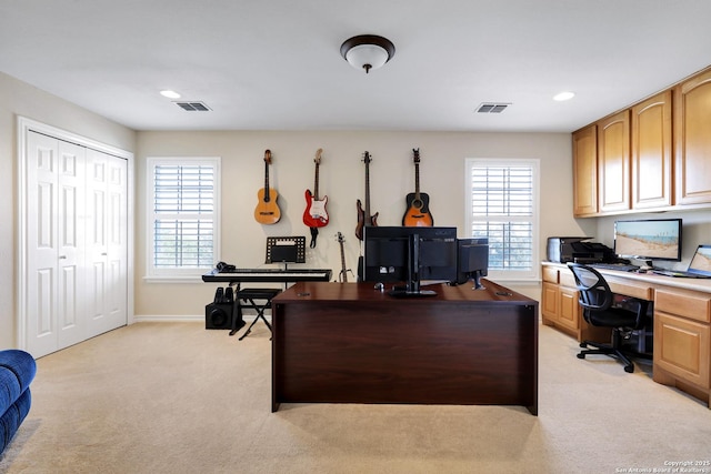 home office with light colored carpet