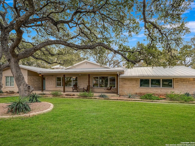 ranch-style house with a front yard