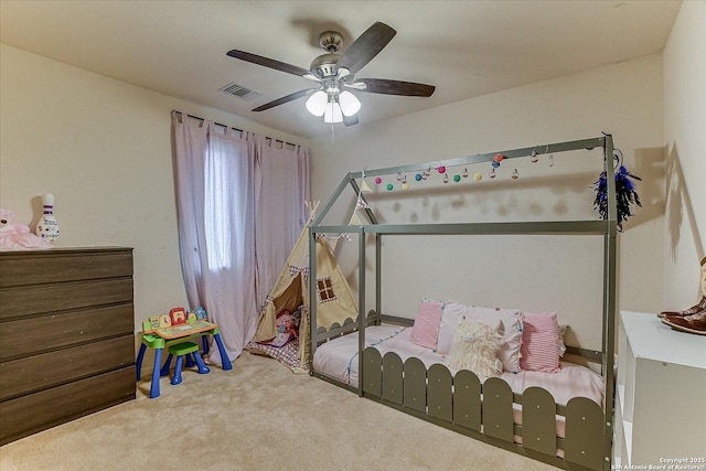 carpeted bedroom with ceiling fan