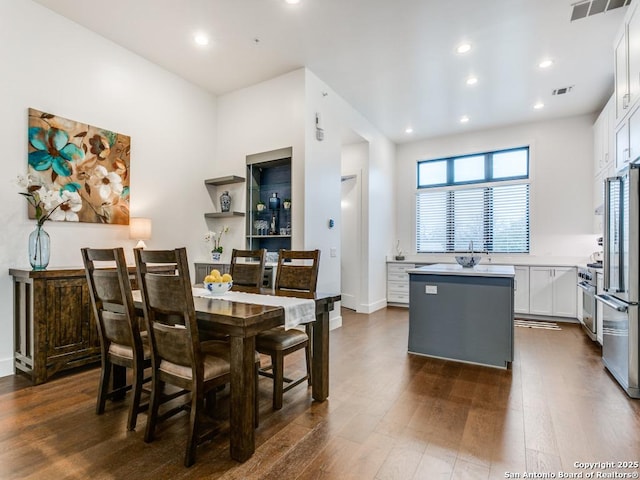 dining room with dark wood-type flooring