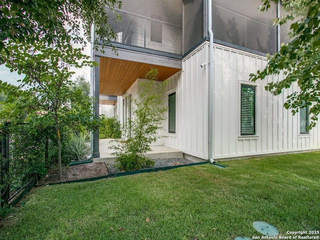 exterior space with a patio and a yard