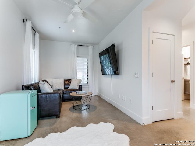 living room with ceiling fan