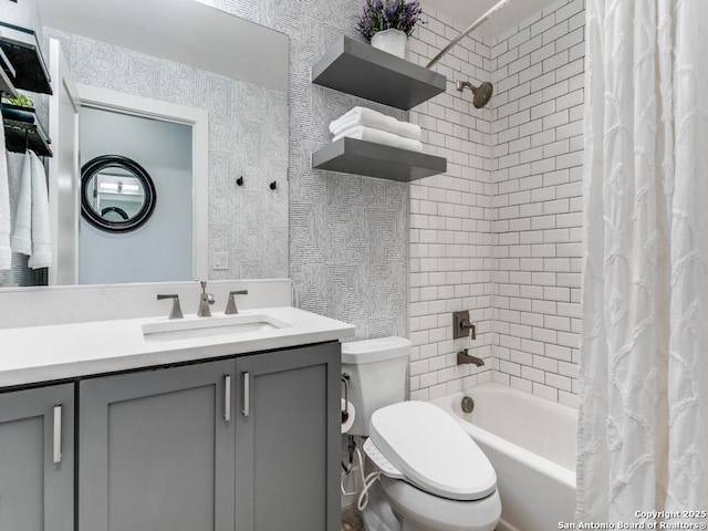 full bathroom with vanity, toilet, and shower / bath combo with shower curtain