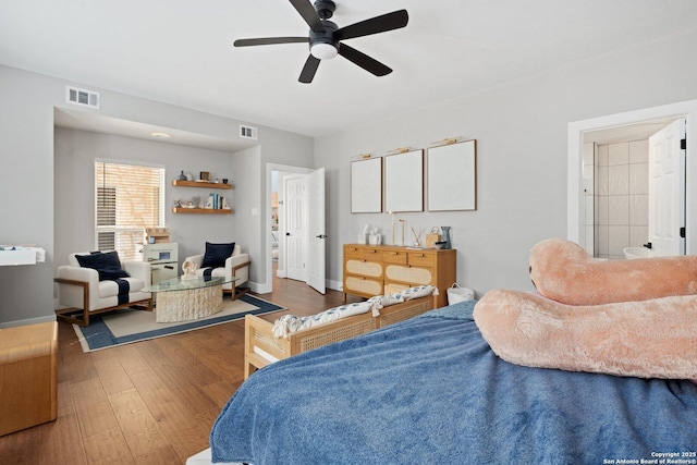 bedroom with dark wood-type flooring and ceiling fan