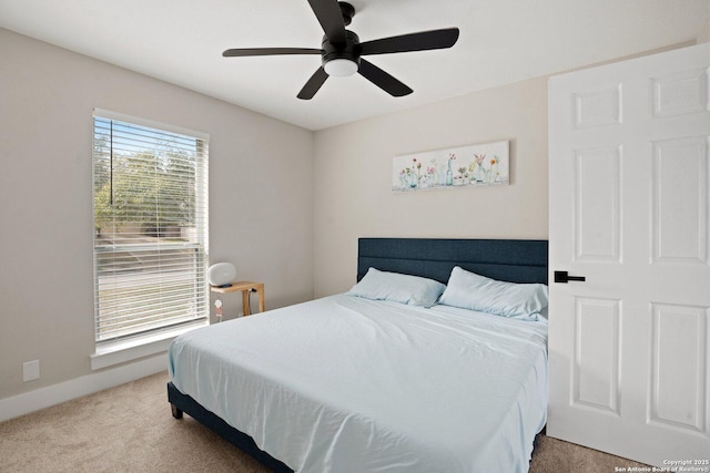 bedroom with carpet flooring and ceiling fan