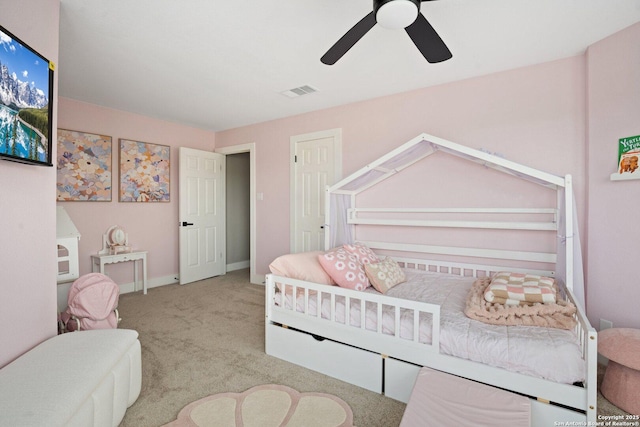 bedroom with ceiling fan and light colored carpet