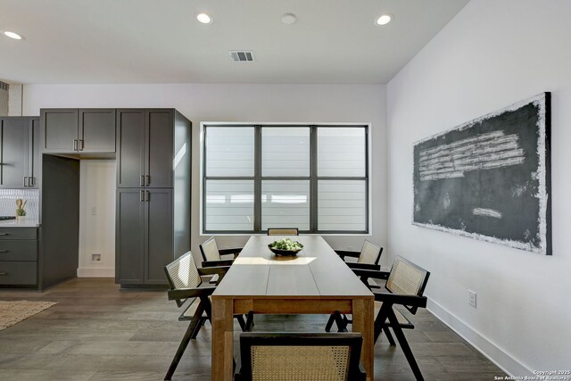 dining space featuring light hardwood / wood-style floors