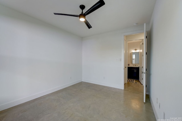 spare room with ceiling fan