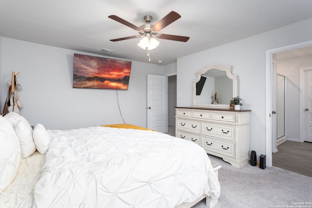 carpeted bedroom featuring ceiling fan