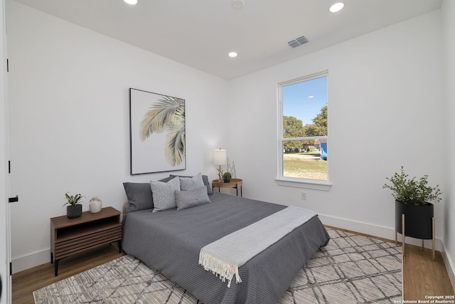 bedroom featuring light hardwood / wood-style floors