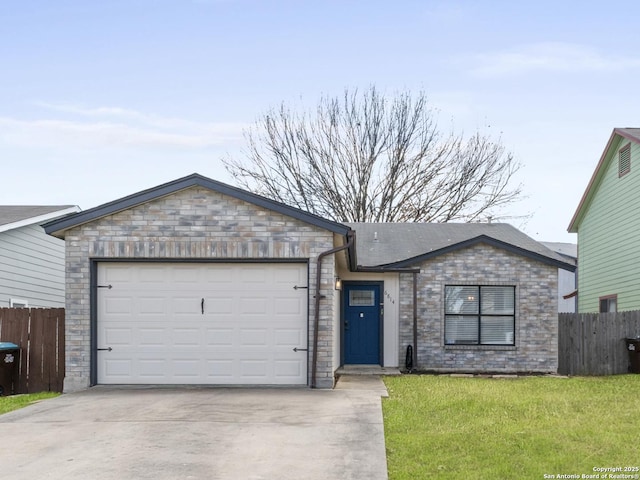 single story home featuring a garage and a front lawn