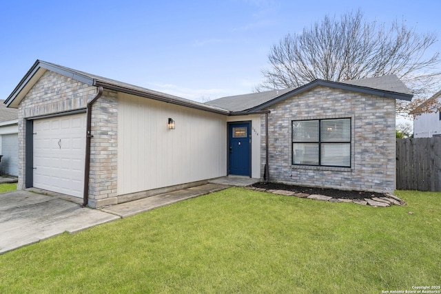 single story home with a garage and a front lawn