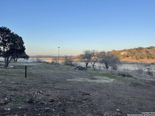 view of yard with a rural view