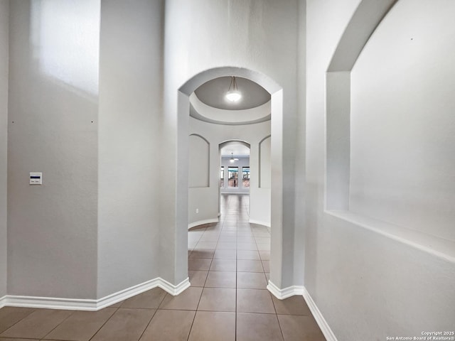 corridor featuring tile patterned floors