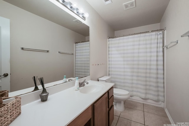 full bathroom with vanity, shower / tub combo, tile patterned floors, and toilet