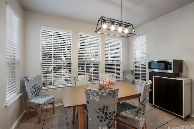 tiled dining area with plenty of natural light