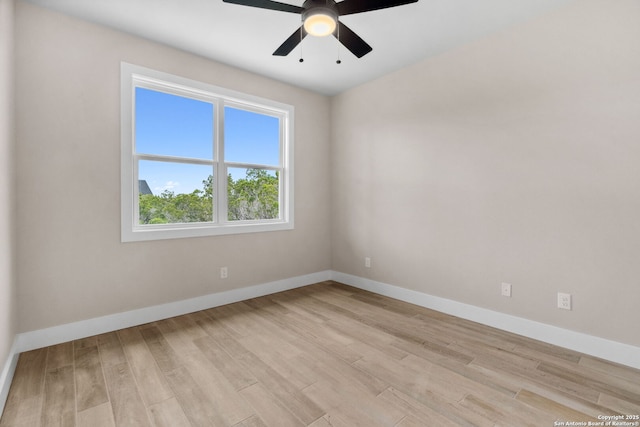 spare room with ceiling fan and light hardwood / wood-style flooring