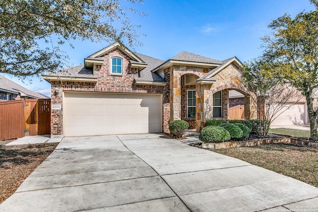 view of front of property featuring a garage