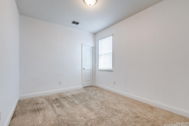 empty room with light carpet