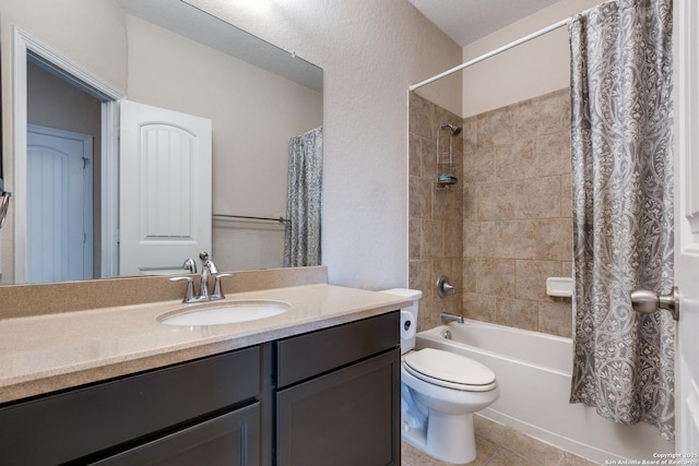 full bathroom featuring vanity, tile patterned flooring, toilet, and shower / bath combo