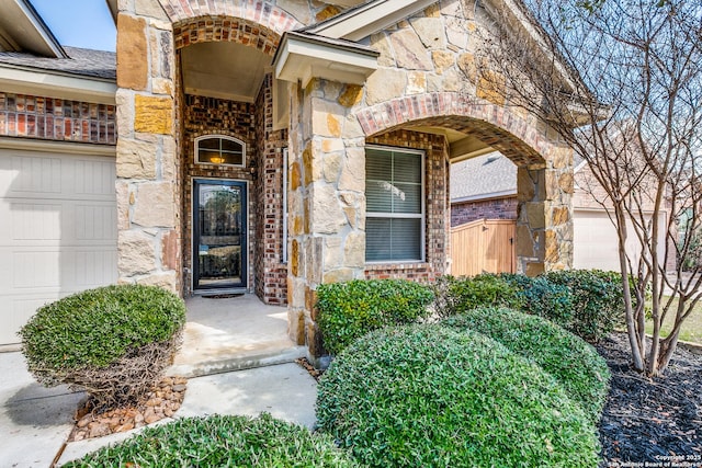 property entrance with a garage