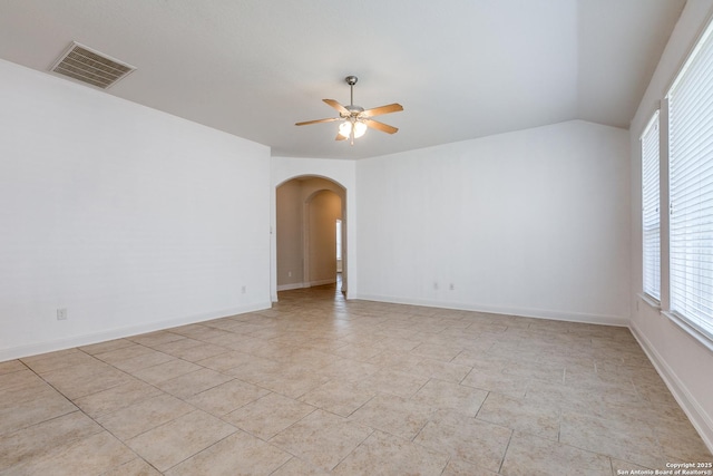 unfurnished room with lofted ceiling and ceiling fan