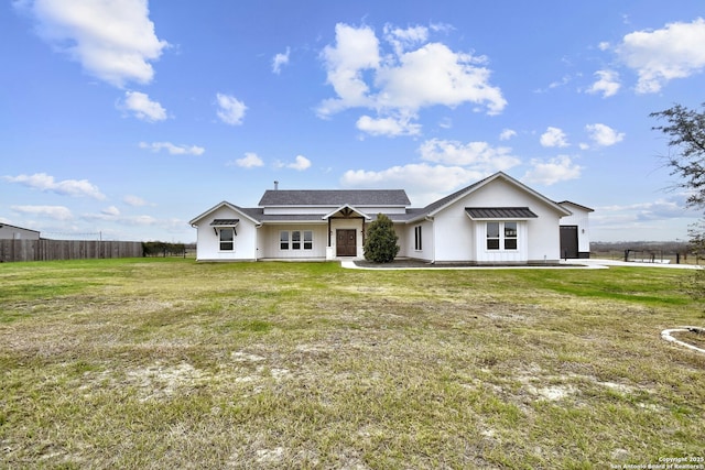 view of front of property with a front yard