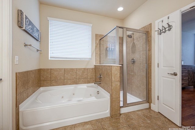 bathroom with plus walk in shower and tile patterned flooring