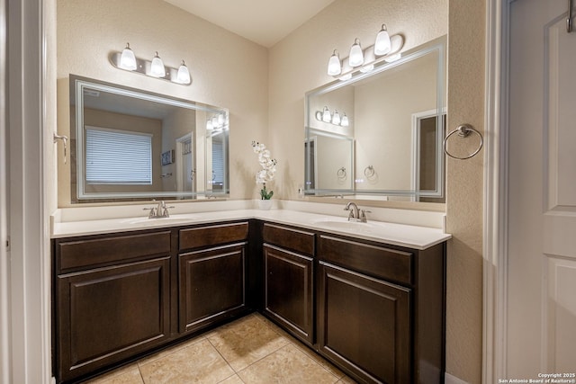 bathroom with vanity and tile patterned floors