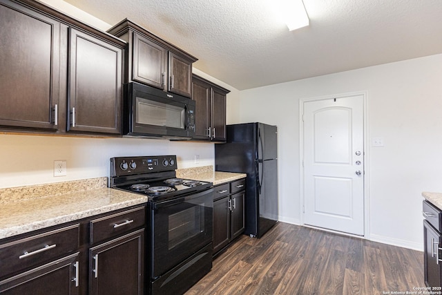 kitchen with dark brown cabinetry, black appliances, dark hardwood / wood-style floors, and a textured ceiling