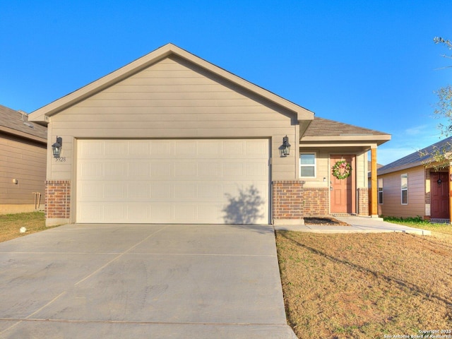 ranch-style home with a garage