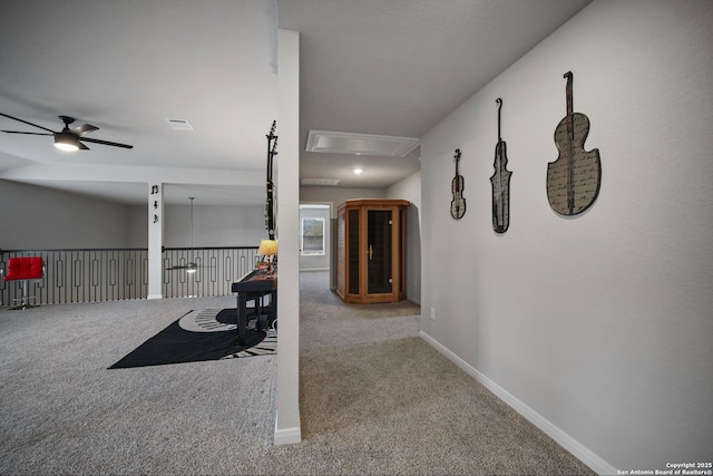 hallway with carpet