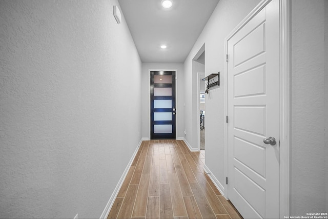 doorway to outside featuring light hardwood / wood-style floors