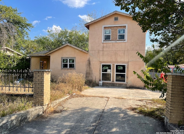 view of front of house with a patio area