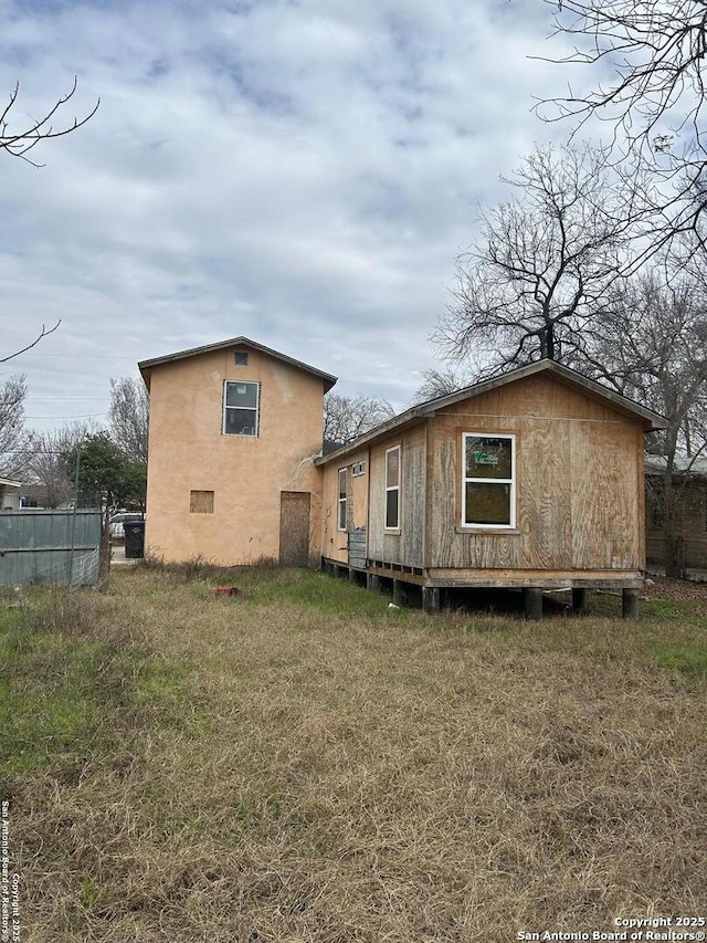 view of property exterior featuring a yard