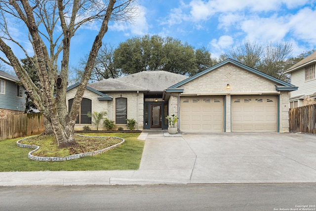 single story home with a garage and a front yard