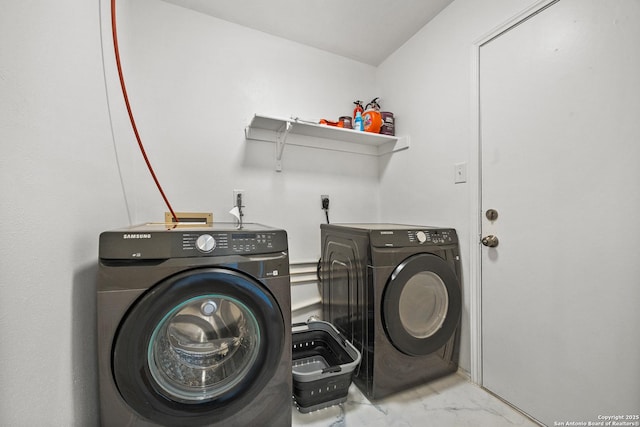 laundry room featuring independent washer and dryer