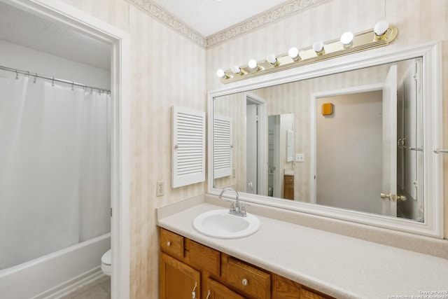 full bathroom featuring vanity, shower / bath combination with curtain, and toilet