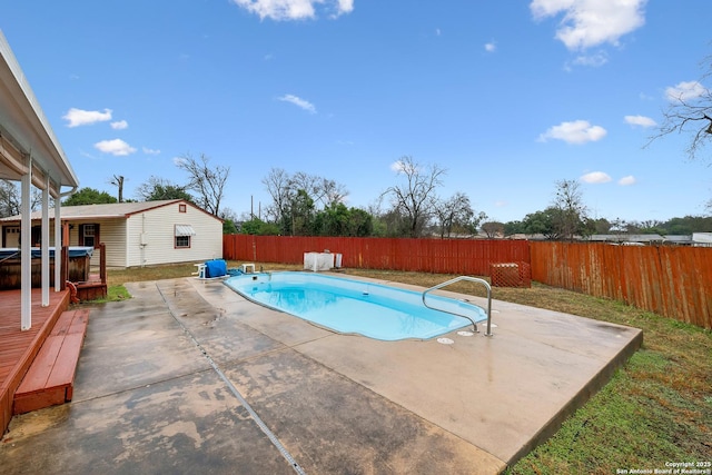 view of swimming pool featuring a patio area