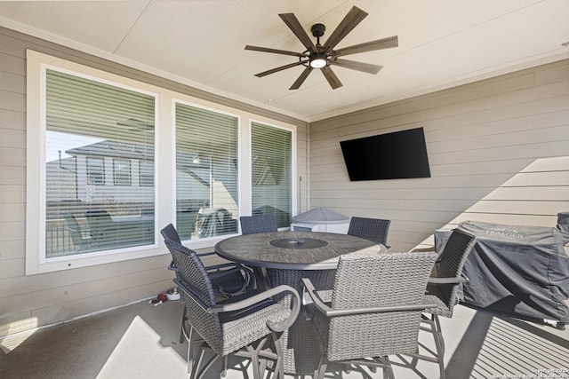 view of patio / terrace featuring ceiling fan