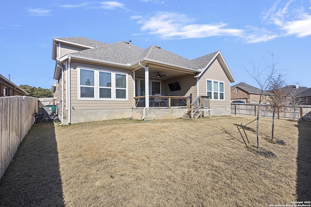 rear view of house with ceiling fan