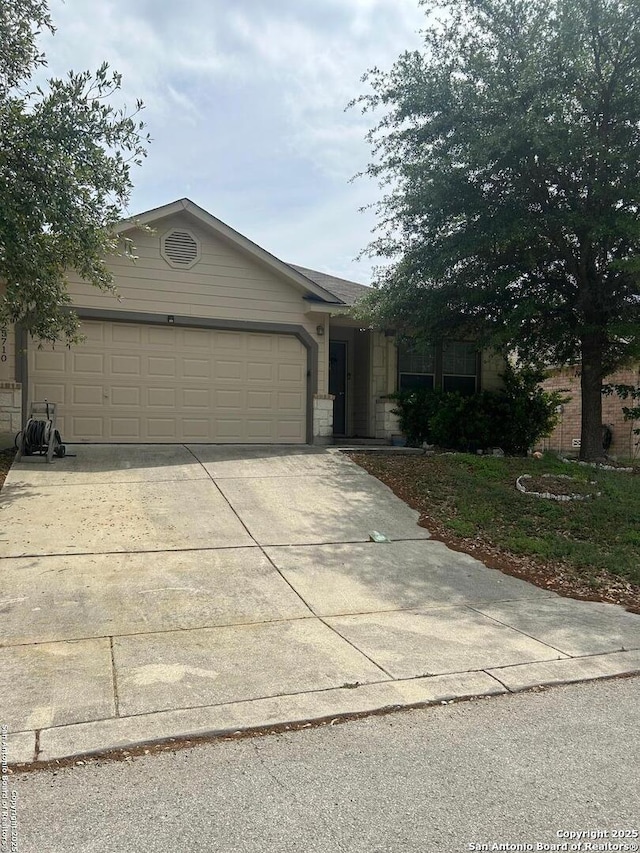 25710 Presidio Aly, Boerne, TX 78015 - ranch-style home featuring an attached garage and concrete driveway